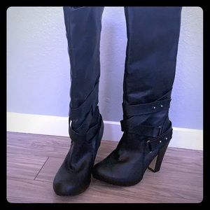 Black boots with straps zip up back